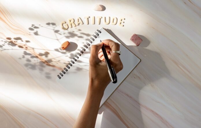 flat-lay-concept-of-writing-a-gratitude-list-with-2024-12-05-06-16-50-utc-scaled