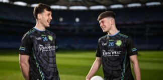 Derry star Shane McGuigan with U15 O Tooles footballer Cillian Hanlon at Croke Park in advance of the John West FC3A9ile Peile na nC393g finals 2026. Photo by David FitzgeraldSportsfile