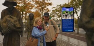a couple use the app by the famine memorial