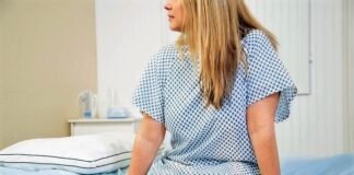 woman female doctor appointment getty