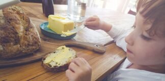 Some Traditional Irish Dishes Could Fade From Everyday Life, New Study Suggests MI little boy bread butter Getty