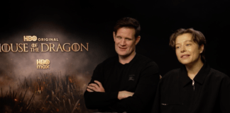 Matt Smith and Emma D'Arcy sit side-by-side during a House of the Dragon promotional interview